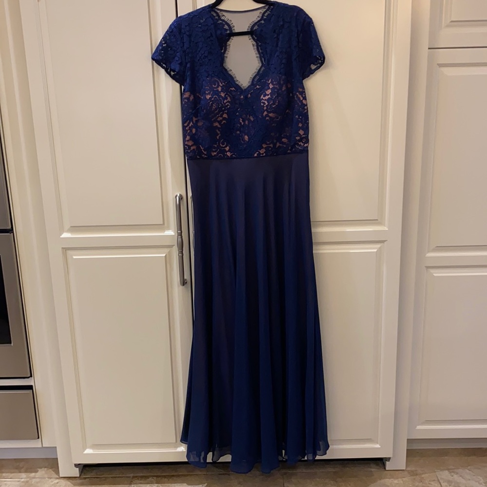 Navy grown with lace detailing on top, pink slip underneath.